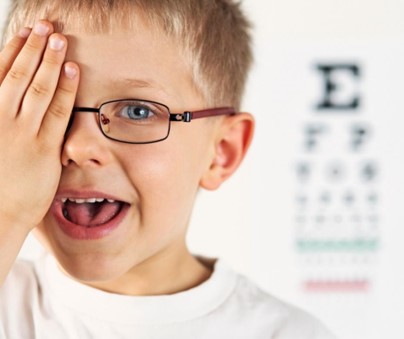 A child taking an eye exam