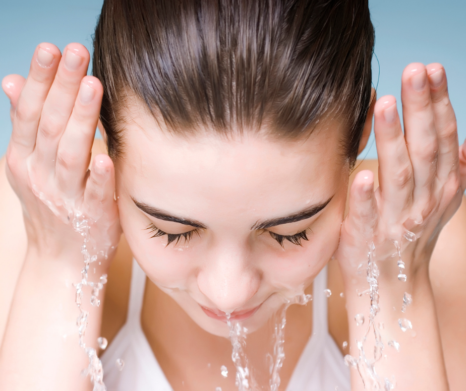 A girl washing her face for eye care