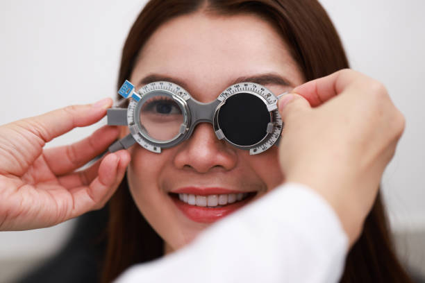 A woman taking an eye exam to get tested for Binocular Vision Disorders